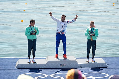 Paris Olympics men's kayak single 1000-meter: Silver medalist, from left, Adam Varga, of Hungary, gold medalist Josef Dostal, of the Czech Republic, and bronze medalist Balint Kopasz, of Hungary